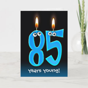 Carte 85e anniversaire bougies avec globes oculaires