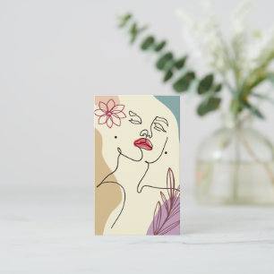 Carte à oreille avec le visage de la femme