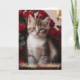 Carte Adorable Kitten Niché dans de belles roses rouges