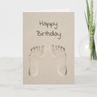 Anniversaire de pieds nus dans le sable de plage