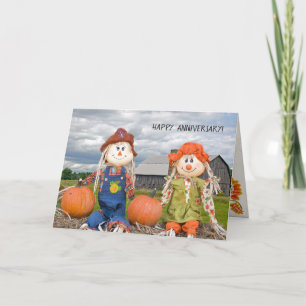 Carte anniversaire épouvantails d'automne sur balle de f