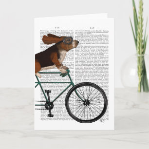 Carte Basset Hound sur bicyclette