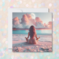 Belle femme méditant sur une couverture de plage