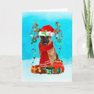 Carte Berger allemand dans la neige avec cadeaux de Noël