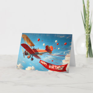 Carte Biplane vintage avec bannière d'anniversaire
