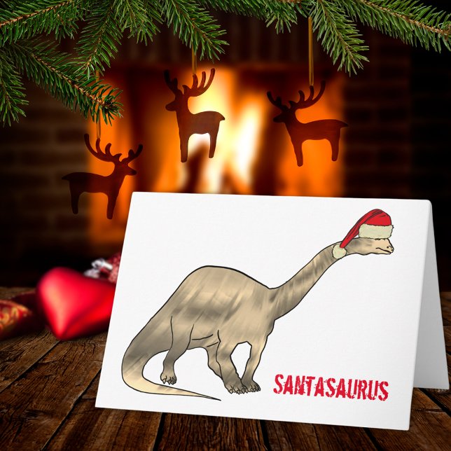 Carte Brontosaurus de Noël amusant Père Noël Dinosaur Sl (Christmas dinosaur santasaurus  cute brontosaurus wearing a Santa hat holiday greetings card )