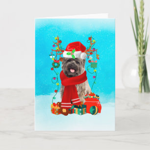 Carte Cairn Terrier dans la neige avec cadeaux de Noël