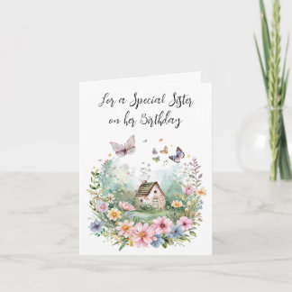 Carte Chalet d'aquarelle dans une couronne fleurie pour