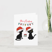 Chats noirs en chapeaux de Père Noël Joyeux Noël