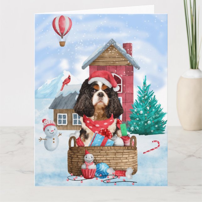 Carte Chien Cavalier King dans la maison de Noël enneigé (Devant)