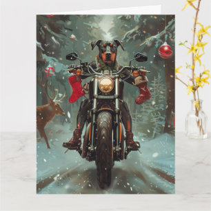 Carte Chien Doberman à moto Noël