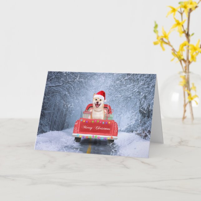 Carte Chien Shiba Inu dans la neige assis dans un camion (Fleur jaune)