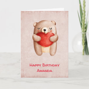 Carte Cute Teddy Bear portant un cœur rouge pour un anni