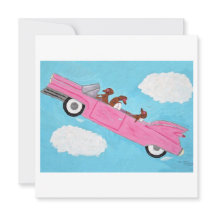 Dachshunds dans une décapotable rose dans le ciel