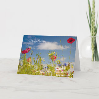 Carte d'anniversaire de pavots et de fleurs