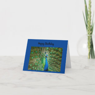Carte d'anniversaire heureuse de paon bleu et vert