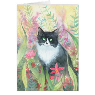 Carte de chat tuxedo dans un jardin