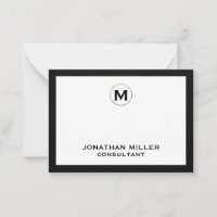 Monogramme initial en cuir noir