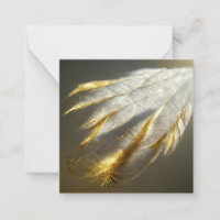 Plumes blanches dorées