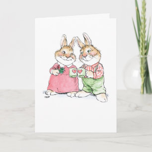 Carte de couple de lapins de Noël