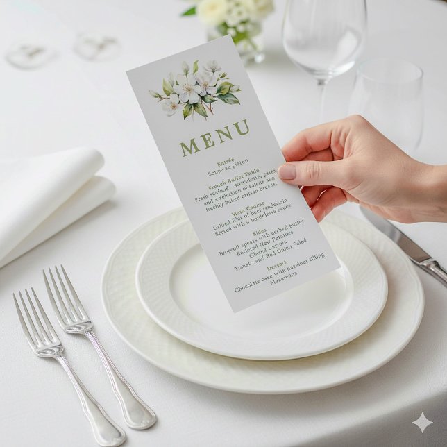 Carte de menu Mariage de fleurs blanches (Pretty apple blossom wedding reception meal menu being held above a dining plate.)