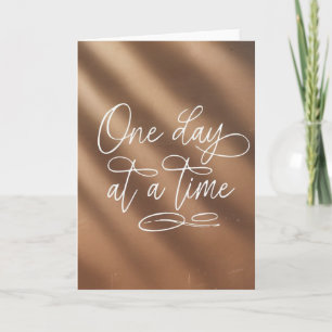 Carte de motivation "Un jour à la fois" en écritur