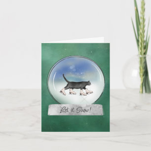 Carte de Noël avec boule à neige représentant un c