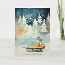 Carte de Noël avec un chat sur un traîneau enneigé