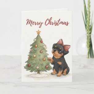 Carte de Noël avec un chiot Rottweiler mignon