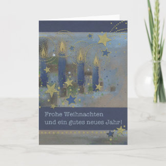 Carte de Noël bleue avec bougies lumineuses