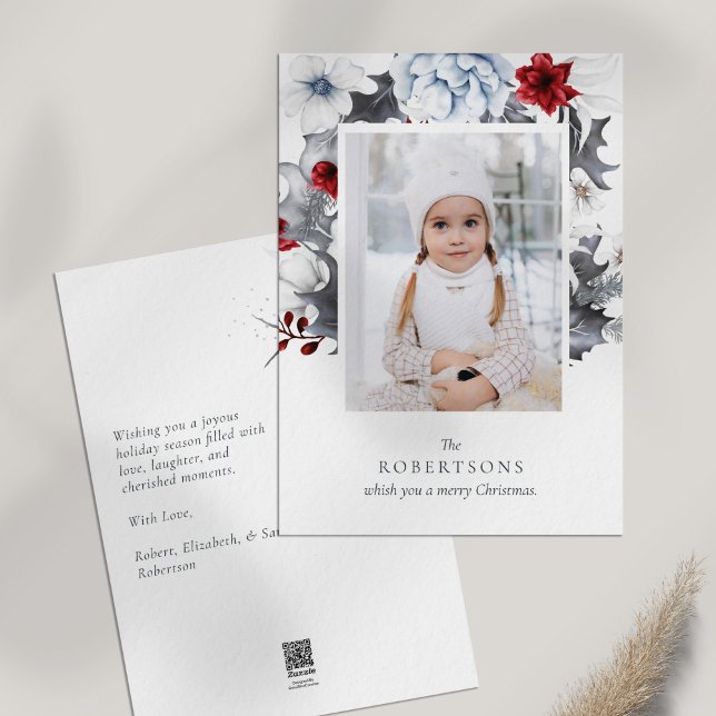 Carte de Noël Botanique Rouge et Blanc (Red and White Botanical Photo Christmas Card on a white table.)