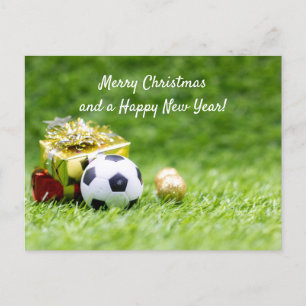 Carte de Noël de football avec boules et boîtes ca