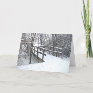 Carte de Noël de pont couvert de neige d'hiver