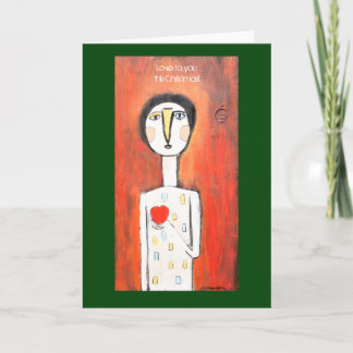 Carte de Noël tenant son cœur haut