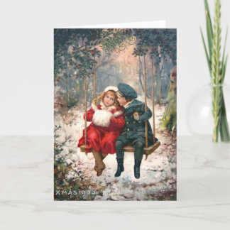 Carte de Noël vintage fille et garçon sur une bala