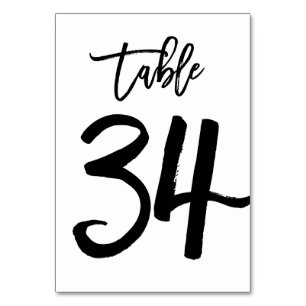 Carte de numéro de table lettres main chic Table