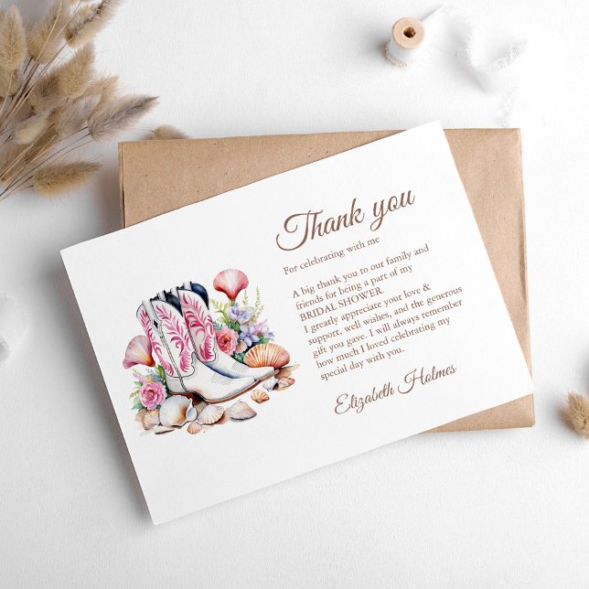 Carte De Remerciements Bottes de cowgirl côtières bohèmes pour une baby s (Boho Coastal Cowgirl Boots Bridal Shower Thank You Card on a white table with boho decor.)