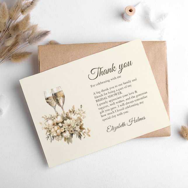 Carte De Remerciements Brunch et Bulles Fleurs de Champagne Shower de Mar (Brunch and Bubbly Champagne Flowers Bridal Shower Thank You Card on a boho white table.)