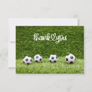 Carte De Remerciements Les balles de football sont sur l'herbe verte