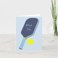 Raquette et balle de pickleball bleue