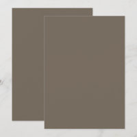 un mur marron avec une horloge noir et blanc dessu