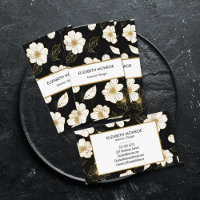 Fleurs blanches et or sur noir