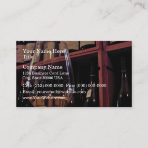 Carte De Visite Verre de vin avec des bouteilles à l'arrière-pla