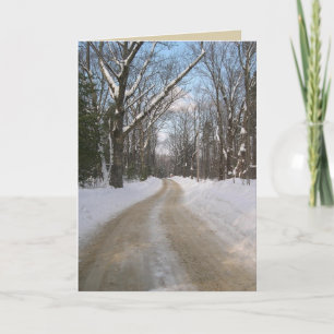 Carte de voeux de photographie de route d'hiver