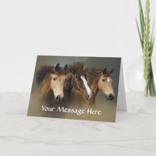 Carte de voeux sauvage de trio de chevaux