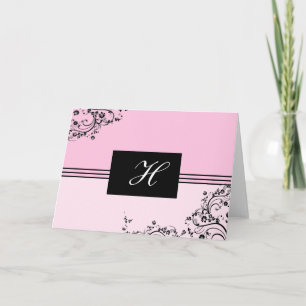 Carte décorée d'un monogramme rose et noire