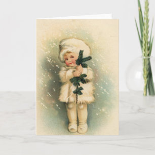 Carte d'enfant dans une tempête de neige