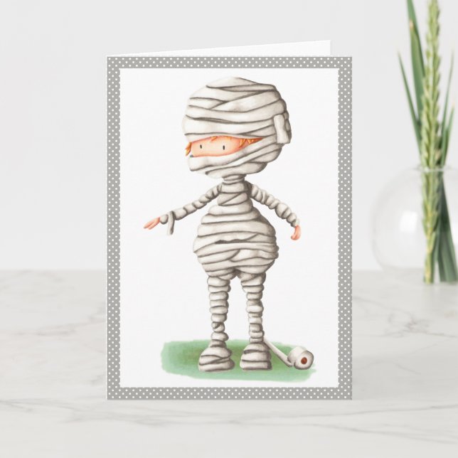 Carte d'Halloween mignonne avec un garçon en costu (Devant)