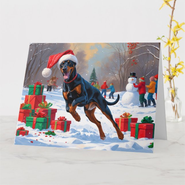 Carte Doberman coule dans la neige avec le Casquette de  (Fleur jaune)