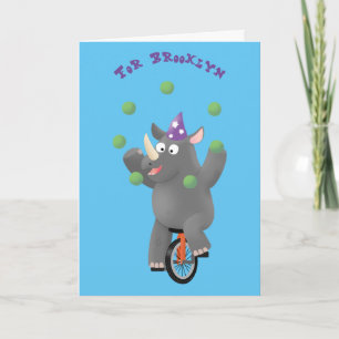 Carte Drôle rhinocéros mignon jonglant sur monocycle